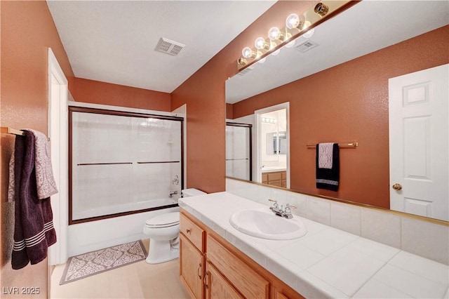 8812 Glenistar Gate Ave, Las Vegas, NV 89143 - full bathroom with vanity and shower / bath combination with glass door