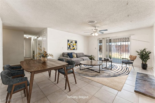 5809 Pebble Beach Blvd, Las Vegas, NV 89108 - living room featuring ceiling fan, light tile patterned floors, and a textured ceiling