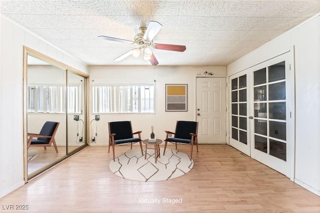 5809 Pebble Beach Blvd, Las Vegas, NV 89108 - sitting room with french doors, wood finished floors, and ceiling fan