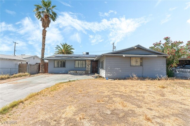 5809 Pebble Beach Blvd, Las Vegas, NV 89108 - ranch-style home featuring solar panels and concrete driveway