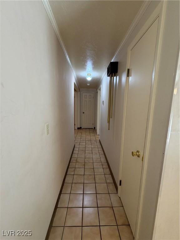 1133 Bell Ave, Ely, NV 89301 - hall featuring crown molding and light tile patterned flooring