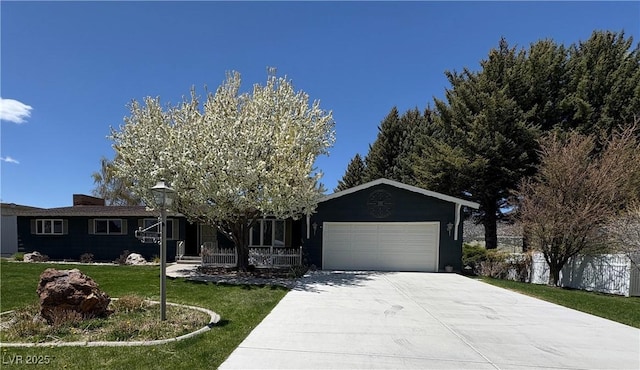 1133 Bell Ave, Ely, NV 89301 - single story home featuring a garage, a front lawn, and driveway