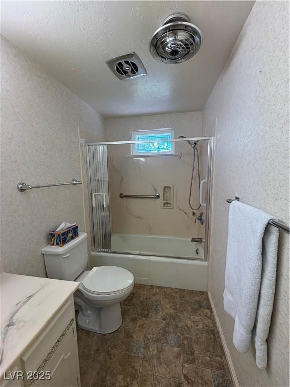 1133 Bell Ave, Ely, NV 89301 - bathroom featuring vanity, combined bath / shower with glass door, and a textured wall