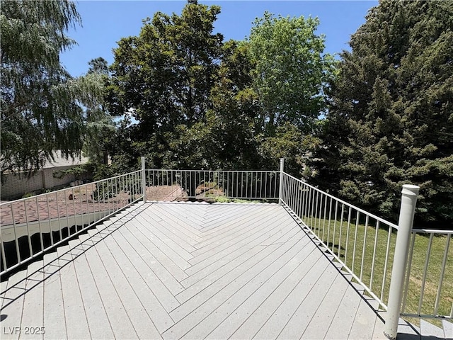 1133 Bell Ave, Ely, NV 89301 - wooden deck with a lawn