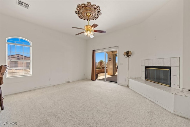 467 Muddy Peak Ct, Overton, NV 89040 - unfurnished living room featuring ceiling fan, carpet floors, and a tile fireplace