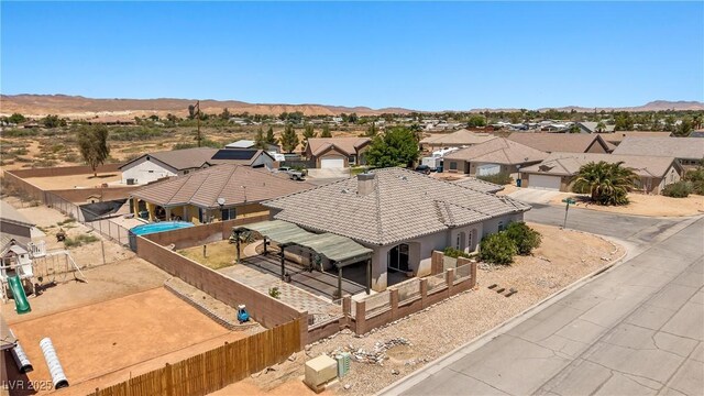 467 Muddy Peak Ct, Overton, NV 89040 - aerial perspective of suburban area with a mountainous background