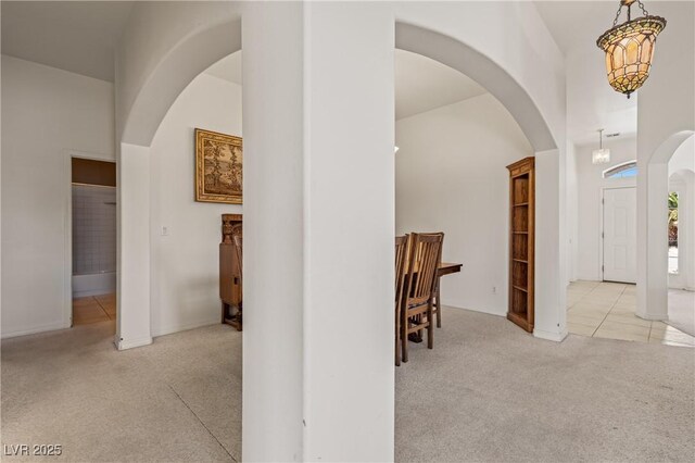 467 Muddy Peak Ct, Overton, NV 89040 - hall with arched walkways and carpet floors