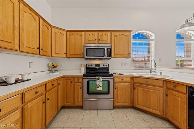 467 Muddy Peak Ct, Overton, NV 89040 - kitchen with appliances with stainless steel finishes, light countertops, and healthy amount of natural light