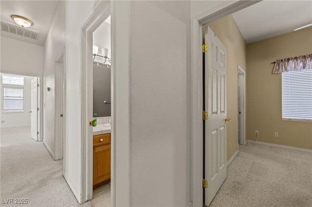467 Muddy Peak Ct, Overton, NV 89040 - hall with light colored carpet and plenty of natural light