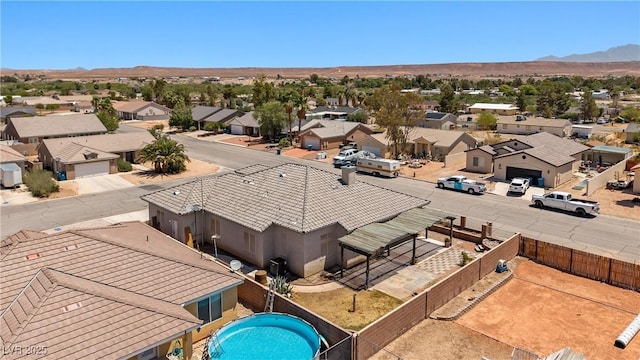 467 Muddy Peak Ct, Overton, NV 89040 - aerial perspective of suburban area with a mountain backdrop