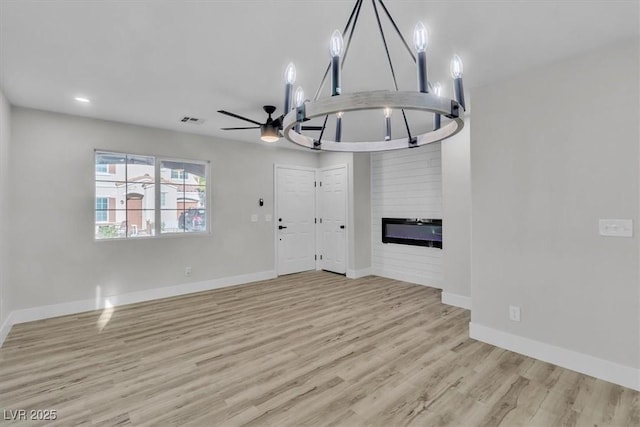 10373 Midnight Iris St, Las Vegas, NV 89183 - entryway with light wood finished floors, a fireplace, and recessed lighting
