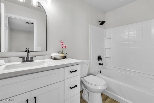 10373 Midnight Iris St, Las Vegas, NV 89183 - full bath with vanity, wood finished floors, and  shower combination