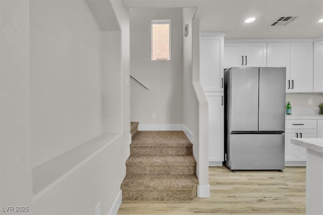 10373 Midnight Iris St, Las Vegas, NV 89183 - staircase featuring recessed lighting and wood finished floors