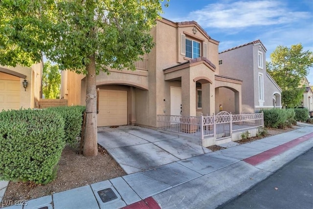 10373 Midnight Iris St, Las Vegas, NV 89183 - view of front of house with concrete driveway, stucco siding, and an attached garage