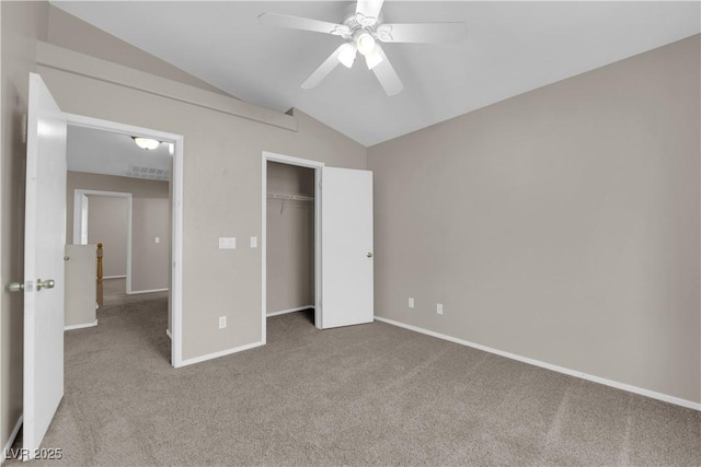1553 Ivygate Ave, Las Vegas, NV 89183 - unfurnished bedroom featuring carpet, lofted ceiling, a closet, and ceiling fan