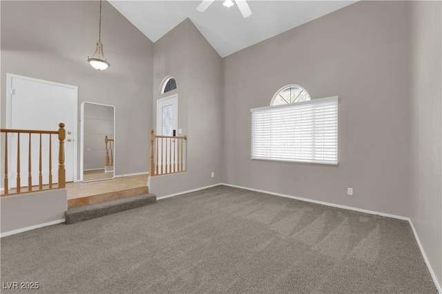 1553 Ivygate Ave, Las Vegas, NV 89183 - spare room featuring carpet floors, ceiling fan, and high vaulted ceiling