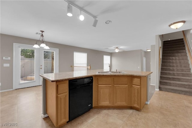 1553 Ivygate Ave, Las Vegas, NV 89183 - kitchen featuring black dishwasher, light tile patterned flooring, ceiling fan, and light stone countertops