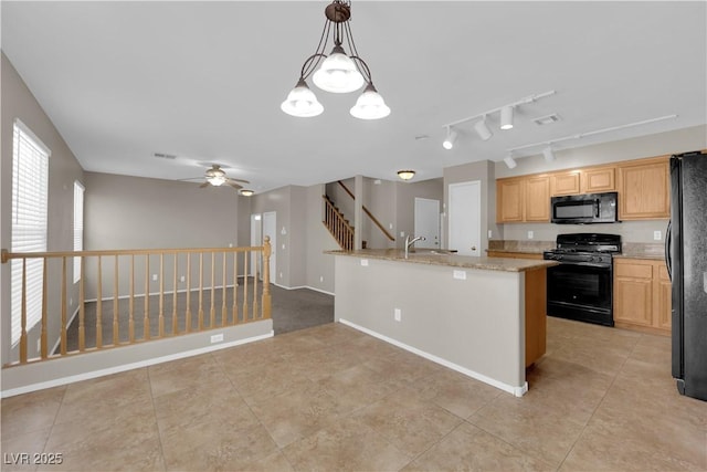 1553 Ivygate Ave, Las Vegas, NV 89183 - kitchen with black appliances, a ceiling fan, light tile patterned floors, a center island with sink, and light brown cabinets