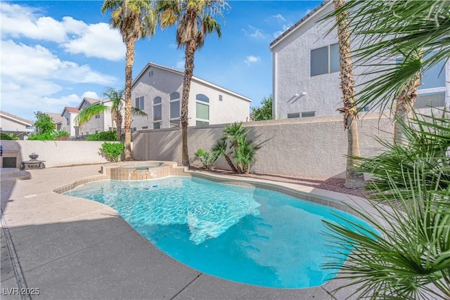 1553 Ivygate Ave, Las Vegas, NV 89183 - view of pool with a fenced backyard, a patio area, and a pool with connected hot tub