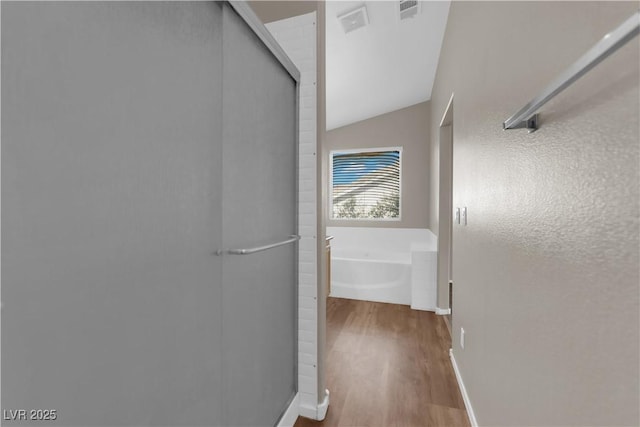 1553 Ivygate Ave, Las Vegas, NV 89183 - hall with wood finished floors and vaulted ceiling