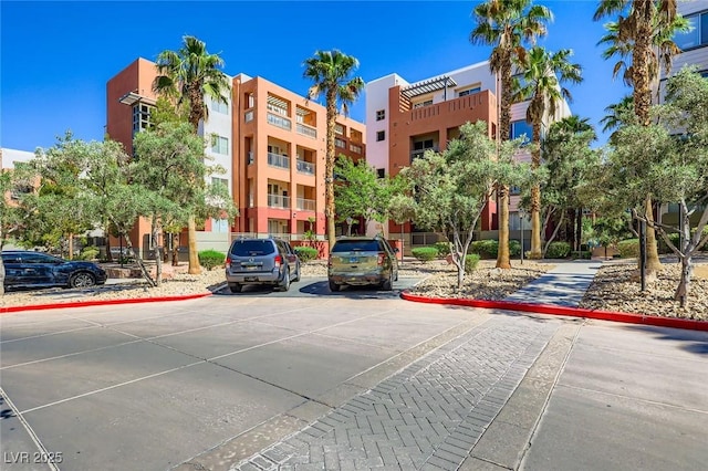 43 E Agate Ave Unit 302, Las Vegas, NV 89123 - view of property featuring uncovered parking