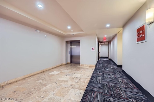 43 E Agate Ave Unit 302, Las Vegas, NV 89123 - corridor with elevator, recessed lighting, and a raised ceiling