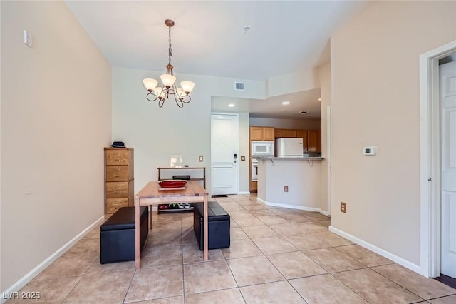 43 E Agate Ave Unit 302, Las Vegas, NV 89123 - dining room featuring a chandelier, light tile patterned floors, and recessed lighting