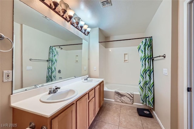 43 E Agate Ave Unit 302, Las Vegas, NV 89123 - full bath with shower / tub combo, double vanity, and tile patterned flooring