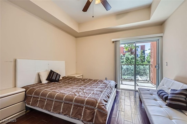 43 E Agate Ave Unit 302, Las Vegas, NV 89123 - bedroom featuring dark wood-style floors, access to exterior, and a ceiling fan