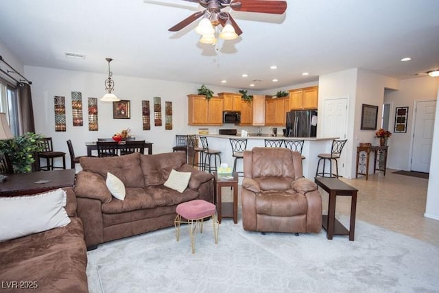 5935 Saddle Horse Ave, Las Vegas, NV 89122 - living area with a ceiling fan and recessed lighting