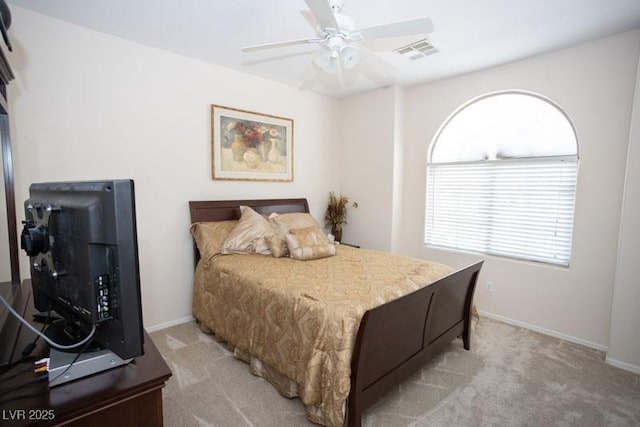 5935 Saddle Horse Ave, Las Vegas, NV 89122 - bedroom with light colored carpet and a ceiling fan