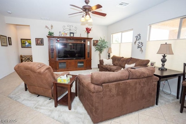 5935 Saddle Horse Ave, Las Vegas, NV 89122 - living room with a ceiling fan and light tile patterned floors