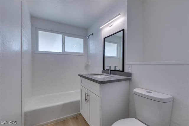 709 N 22nd St, Las Vegas, NV 89101 - bathroom featuring vanity, tub / shower combination, and wood finished floors
