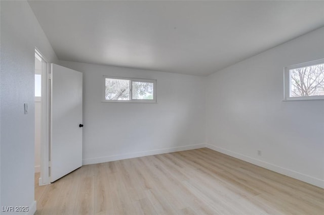 709 N 22nd St, Las Vegas, NV 89101 - empty room with wood finished floors and baseboards