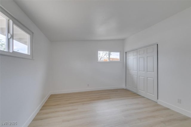709 N 22nd St, Las Vegas, NV 89101 - unfurnished bedroom featuring light wood-type flooring and a closet