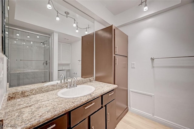 2732 Heritage Ct, Las Vegas, NV 89121 - bathroom featuring vanity and a stall shower