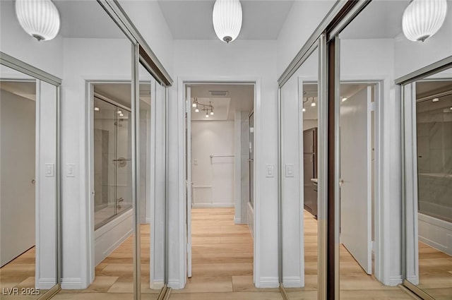2732 Heritage Ct, Las Vegas, NV 89121 - corridor featuring light wood-style floors