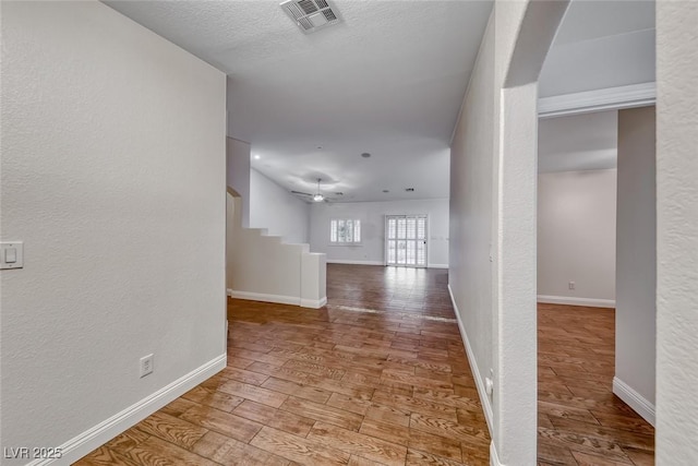 1643 Silver Slipper Ave, Henderson, NV 89002 - corridor featuring arched walkways and wood finished floors