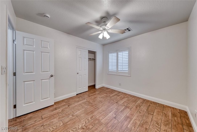 1643 Silver Slipper Ave, Henderson, NV 89002 - unfurnished bedroom featuring light wood-style flooring, a closet, and ceiling fan