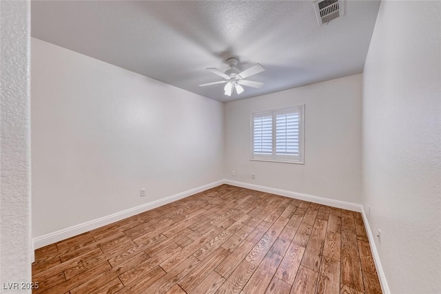 1643 Silver Slipper Ave, Henderson, NV 89002 - spare room with wood-type flooring and a ceiling fan