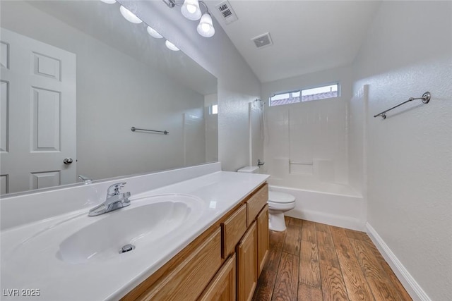 1643 Silver Slipper Ave, Henderson, NV 89002 - bathroom featuring wood finished floors, vanity, and shower / tub combination