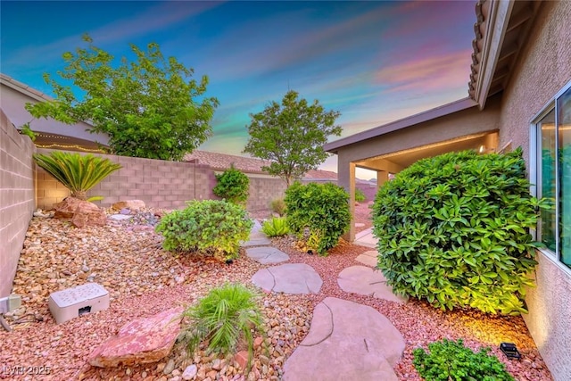 1643 Silver Slipper Ave, Henderson, NV 89002 - yard at dusk with a fenced backyard