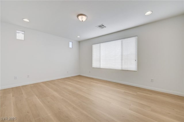 7775 Tyrell Peaks St, Las Vegas, NV 89139 - empty room featuring light wood finished floors and recessed lighting