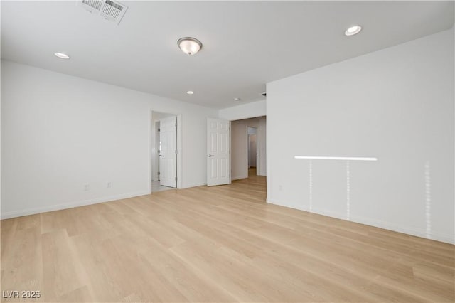 7775 Tyrell Peaks St, Las Vegas, NV 89139 - unfurnished room featuring light wood-style floors and recessed lighting