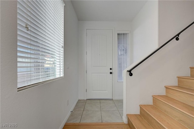 7775 Tyrell Peaks St, Las Vegas, NV 89139 - entrance foyer featuring stairs and light tile patterned floors