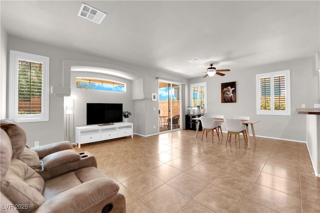 11139 Zarod Rd, Las Vegas, NV 89135 - living area featuring light tile patterned flooring and ceiling fan