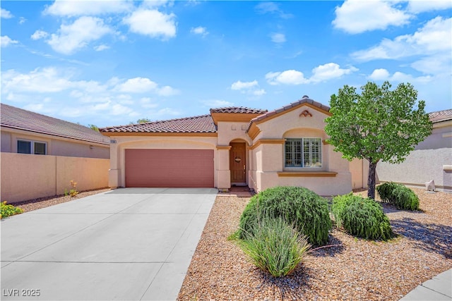 11139 Zarod Rd, Las Vegas, NV 89135 - mediterranean / spanish house with stucco siding, driveway, an attached garage, and a tile roof