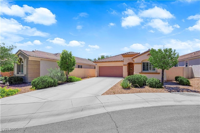 11139 Zarod Rd, Las Vegas, NV 89135 - mediterranean / spanish-style house featuring a tiled roof, stucco siding, a garage, and driveway