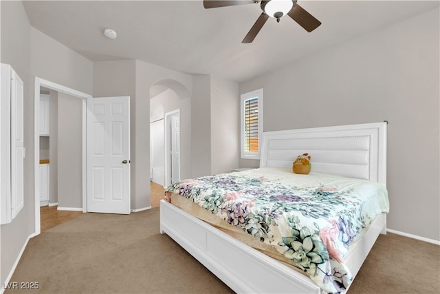 11139 Zarod Rd, Las Vegas, NV 89135 - carpeted bedroom with arched walkways and ceiling fan