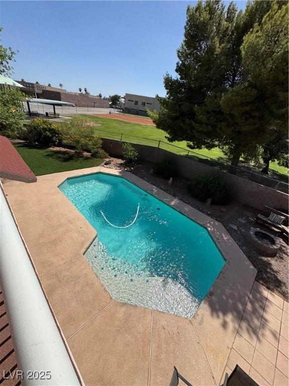 6293 Pavestone Ln, Las Vegas, NV 89142 - view of pool with a patio and a fenced backyard